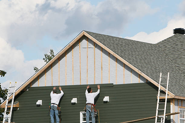 Professional Siding Contractor technician working in Linden, TN